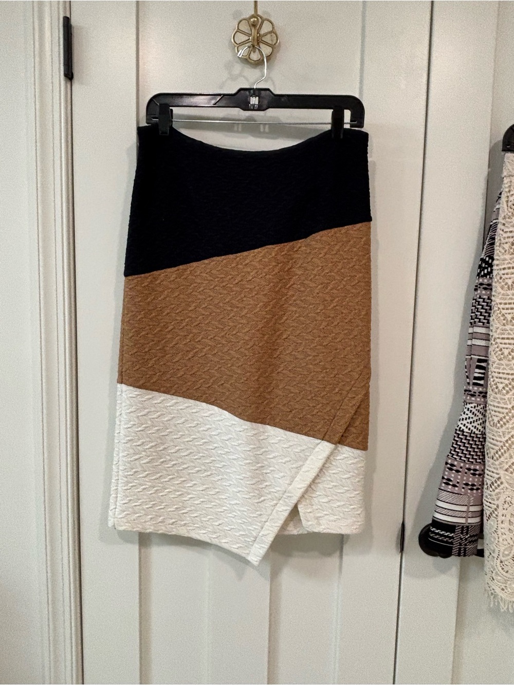 HD in Paris Black, Brown, and White Asymmetrical Colorblock Knit Skirt